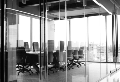 black and white image of a boardroom